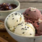 Scoop of Azuki red bean ice cream in glass bowl
