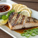 Grilled hamachi yellowtail collar with lemon